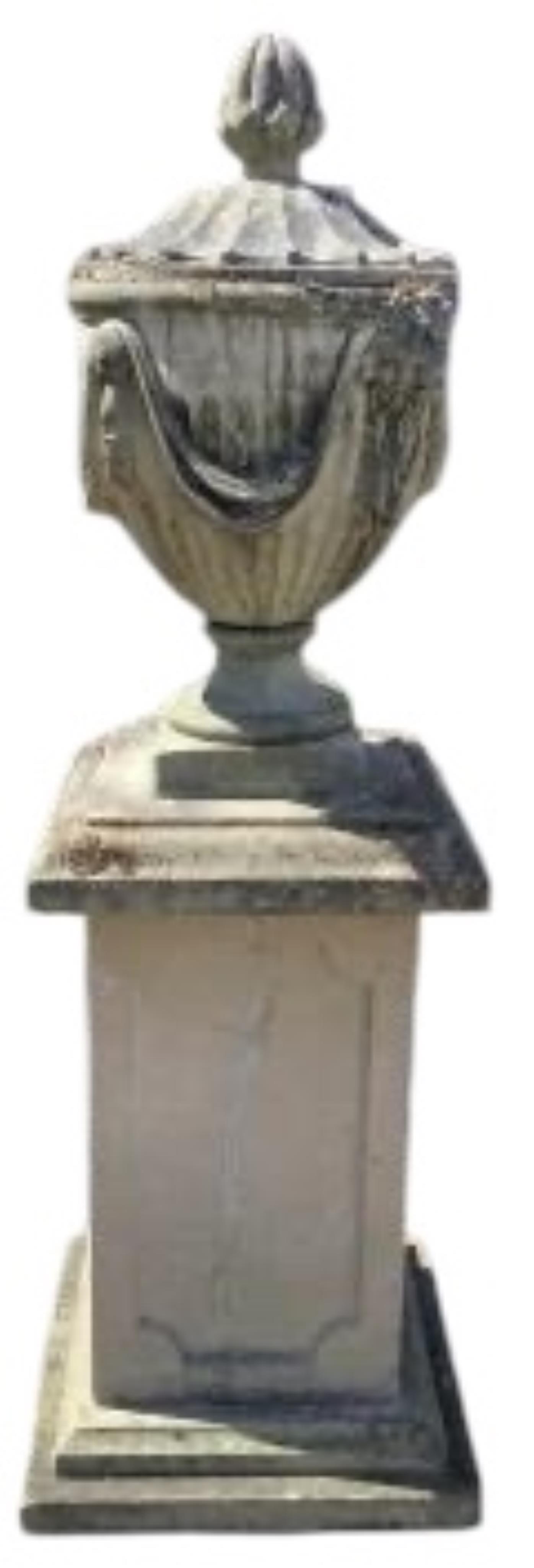 A reconstituted stone Adam style lidded garden urn on a square pedestal base, height 160cm